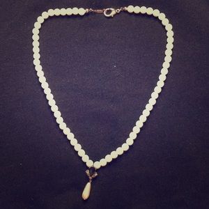 pearl necklace with sapphire charm